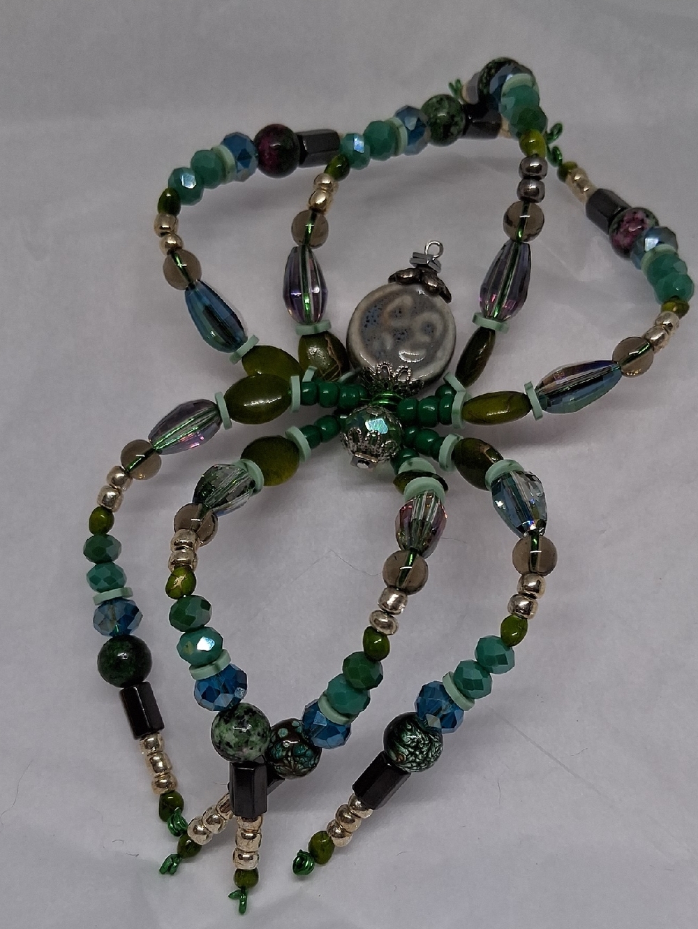 OM BEADED SPIDER SUNCATCHER